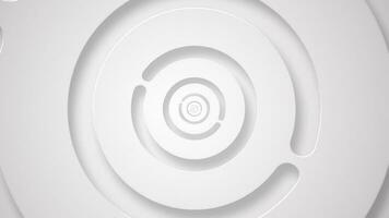 Elegant clean white abstract background with gently rotating concentric circles. This simple minimalist geometric background is full HD and a seamless loop. video