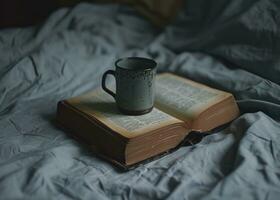 ai generado un taza es sentado en un abierto libro en el cama foto