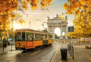 Arch and tram in autumn photo