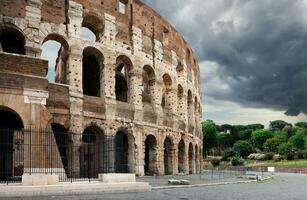 Thunder clouds over Colosseum photo