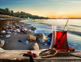 Sea and turkish tea photo