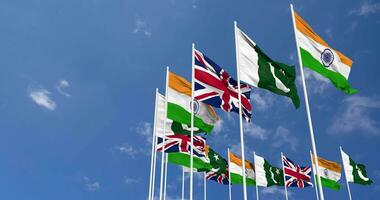Unidos reino, Índia e Paquistão bandeiras acenando juntos dentro a céu, desatado ciclo dentro vento, espaço em esquerda lado para Projeto ou Informação, 3d Renderização video