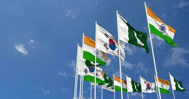 South Korea, India and Pakistan Flags Waving Together in the Sky, Seamless Loop in Wind, Space on Left Side for Design or Information, 3D Rendering video