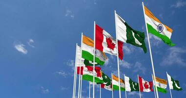 Canada, India and Pakistan Flags Waving Together in the Sky, Seamless Loop in Wind, Space on Left Side for Design or Information, 3D Rendering video