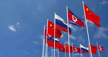 North Korea, China and Russia Flags Waving Together in the Sky, Seamless Loop in Wind, Space on Left Side for Design or Information, 3D Rendering video