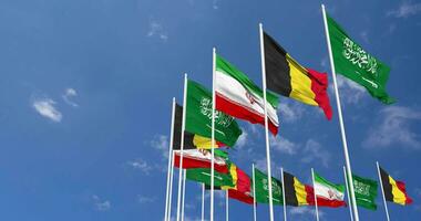 Belgium, Iran and KSA, Kingdom of Saudi Arabia Flags Waving Together in the Sky, Seamless Loop in Wind, Space on Left Side for Design or Information, 3D Rendering video