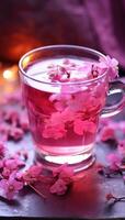 AI generated a cup of pink tea with flowers in it photo