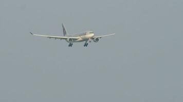 Airbus A330 of Qatar landing, sea background video