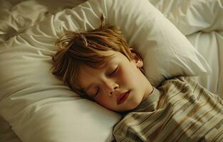 ai generado un pequeño chico dormido en un blanco almohada foto