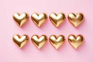 AI generated an image of four golden hearts on a pink background photo