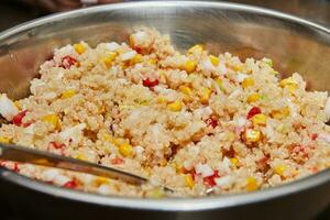 Fresh ingredients for making boiled corn and tomato salad with swan oil and onion filling photo