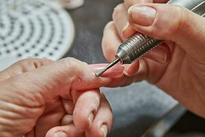 Manicure Salon Service for Gel Nail Extension and Perfect Polish by Skilled Nail Technician photo