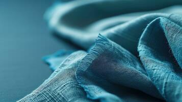 AI generated Close-up of textured blue fabric with frayed edge photo