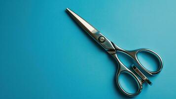 AI generated Metal scissors with large loops on a blue background photo