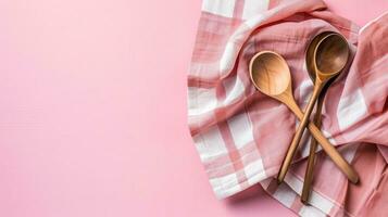 AI generated Wooden spoons on a checkered pink napkin photo