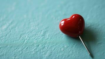 AI generated A red heart-shaped lollipop on a turquoise background photo