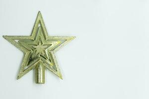 Christmas star decoration on white background. Top view with copy space for text. photo