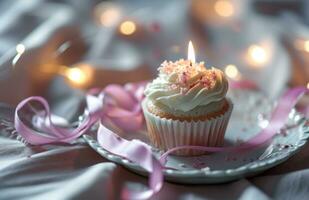 AI generated a cupcake with a candle and a pink ribbon photo