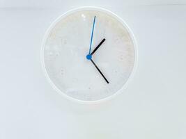 Closeup decorate modern white clock wall isolate on white background. photo
