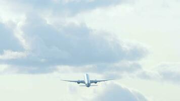 Rear view of an airplane gaining altitude video