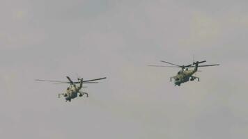 Group of military helicopters in the sky video