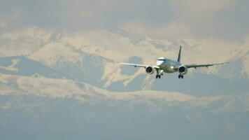 Airplane and snowy mountains video