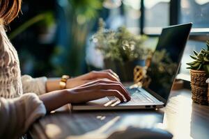 AI generated Close up of female hands typing on laptop keyboard at table in cafe photo