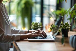 AI generated Close up of female hands typing on laptop keyboard at table in cafe photo