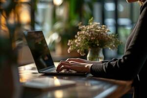 AI generated Close up of female hands typing on laptop keyboard at table in cafe photo