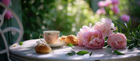 ai generado rosado peonias, taza de té y bollos en el fuera de mesa foto