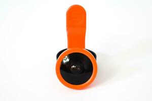 Extension Clip on fisheye lens for mobile device, smartphone or tablet isolated on white background, modern mini portable gadget, mini objective to attact on smartphone photo camera