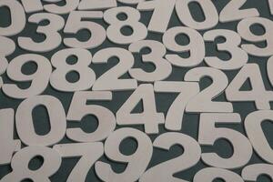 Background of numbers. from zero to nine. Numbers texture. Finance data concept. Matematic. Seamless pattern with numbers. financial crisis concept. Business success. photo