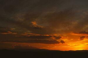 The warm and colorful illumination of the sky during sunset. photo