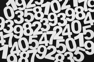 Background of numbers. from zero to nine. Numbers texture. Finance data concept. Matematic. Seamless pattern with numbers. financial crisis concept. Business success. photo