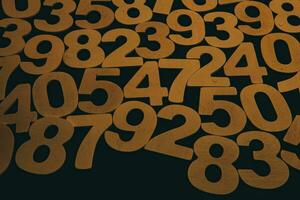 Wooden numbers on a black background. Numbers of different colors. photo