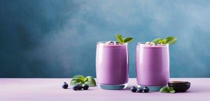 AI generated two purple fruit yogurt smoothies on a table photo