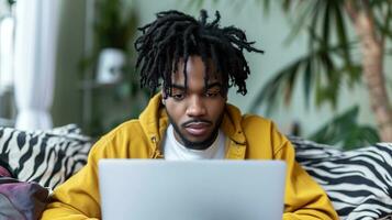 AI generated Young happy man using a laptop while he is sitting on a couch. photo