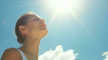 AI generated Smiling woman enjoying sunshine with blue sky and sunflare photo