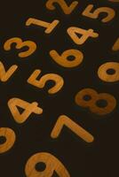 Numbers on a dark background. Seamless pattern. Toned. photo