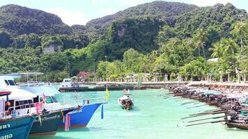 Koh Phi Phi Krabi Thailand 2018 Longtail boat boats at the beautiful famous beach pier Koh Phi Phi Don Thailand. video