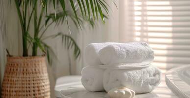 AI generated white towels are placed on a table in a bathroom. photo