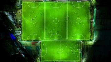 Aerial time lapse of soccer fields during match at night video