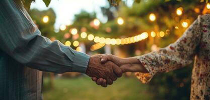 AI generated a senior couple is holding hands while at a yard party photo