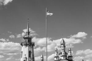 Christian church cross in high steeple tower for prayer photo