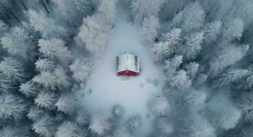 AI generated a red house is covered in snow in a wooded area photo