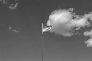 Photography on theme national Ukrainian flag in peaceful sky photo