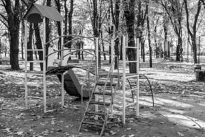 Photography on theme empty playground with metal slide for kids photo