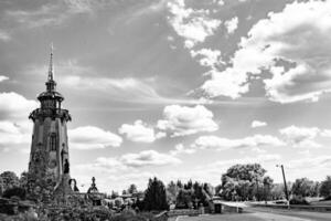 Christian church cross in high steeple tower for prayer photo