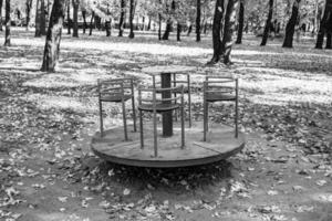 Photography on theme empty playground with metal swing for kids photo