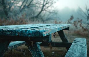 ai generado un de madera picnic mesa en medio de un campo foto